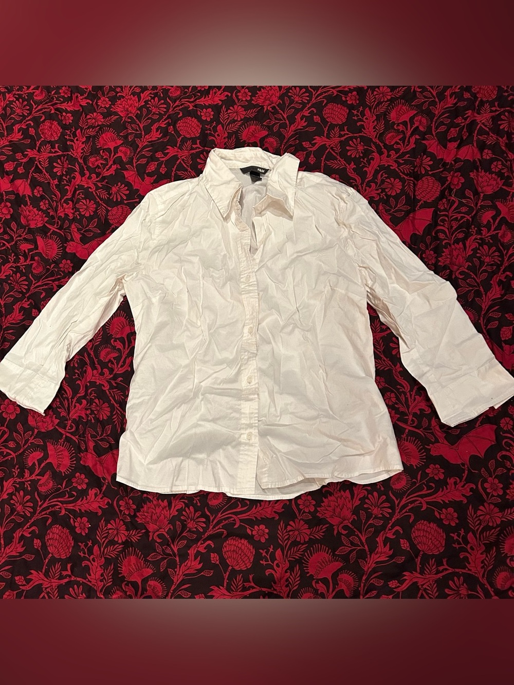 White H&M button up shirt with 3/4 length sleeves